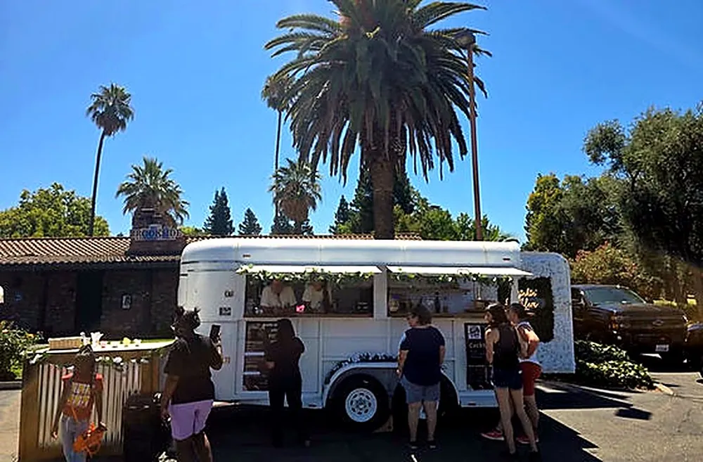 Guests at the Saddle Up trailer at an outdoor event
